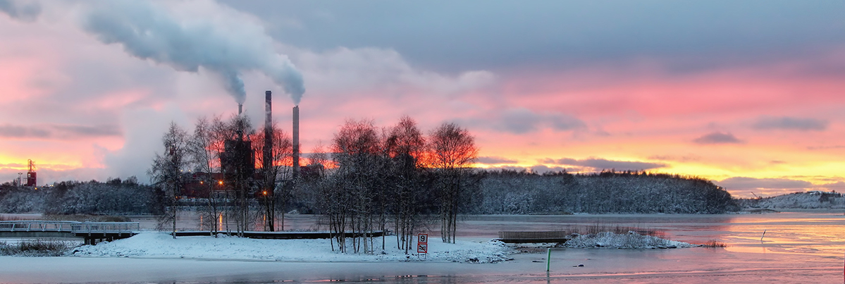 Factory Chimney Stacks at Sunset
